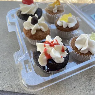 a tray of cupcakes