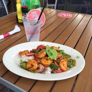 a plate of shrimp and rice