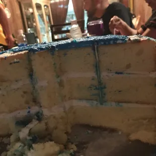 Bamboo sticks holding up the cake