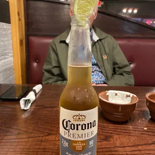 He hates being in my Yelp photos! Lol! Corona Premier 2.6 carbs! Yes please!