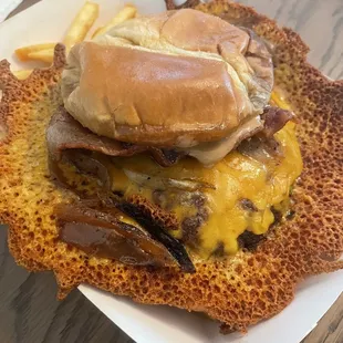 a hamburger with french fries