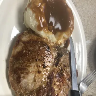 a steak and mashed potatoes