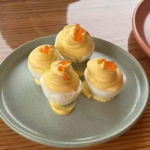 DEVILED EGGS $9 dukes mayo, garlic confit, caper, trout roe, chive