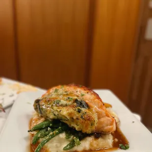 Crab, spinach, and cheese stuffed salmon