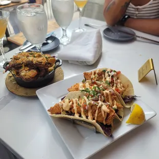 Fried fish tacos with brisket Mac and cheese