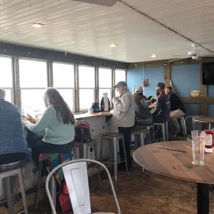Bar area - cute, cozy and beachy in real life.