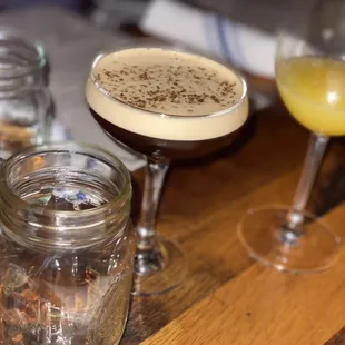 three cocktails on a bar