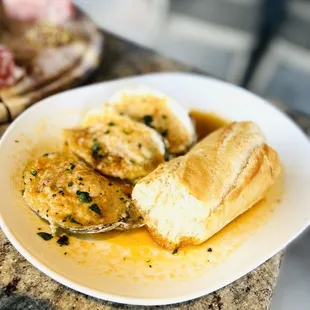 Baked oysters. Very good but heads up they are spicy!