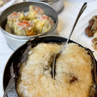 Dim sum - Steamed shrimp dumpling, steamed shrimp and pork shumai, and sticky rice in lotus leaf