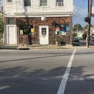 a brick building on a street corner