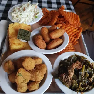 Sides and corn bread and hush puppies