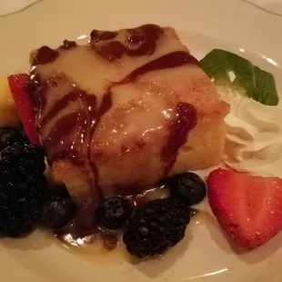 Warm White Chocolate Bread Pudding Served with White and Dark Chocolate Sauces