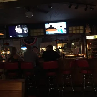 people sitting at the bar