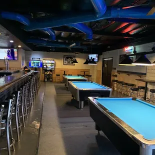 a pool table in a bar