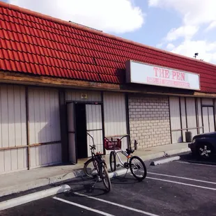 a bicycle parked in front of a building