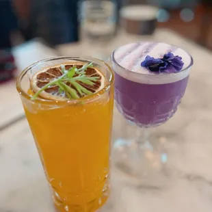 two cocktails on a table