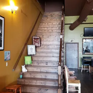 the stairs leading to the dining room