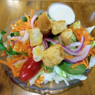 a salad on a glass plate