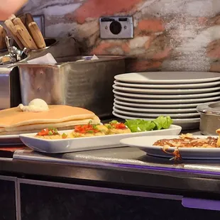 I dont know who ordered it but the pancakes are huge so if you order them u better be hungry lol.