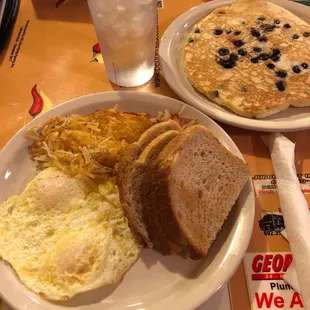 Two egg breakfast + one blueberry pancake