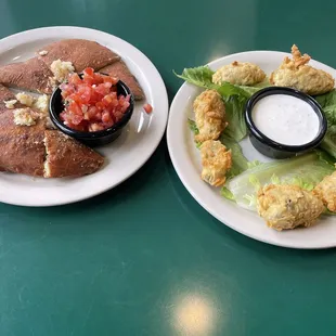 Pocket bread and jalapeño poppers.