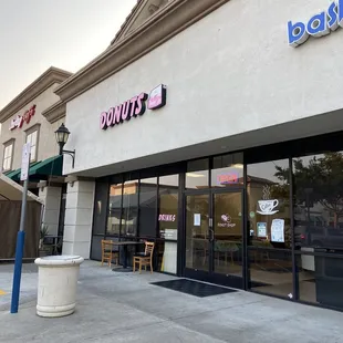 the outside of a donut shop