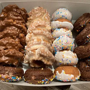 a variety of doughnuts in a box