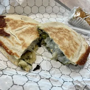 Chicken and spinach pita melt
