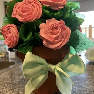 a potted rose arrangement