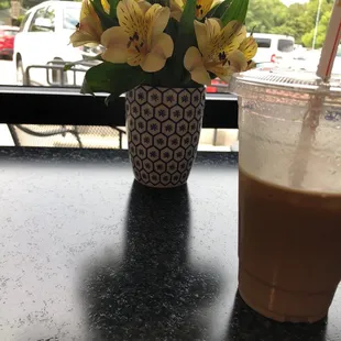 Iced dirty chai latte &amp; beautiful fresh flowers at my table!