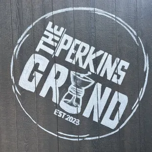 the logo on the side of a building