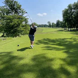 Hole 2, par 4 with severe slope from right to left of in the fairway