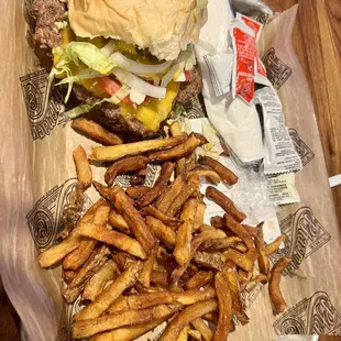 a tray of fries and a hamburger