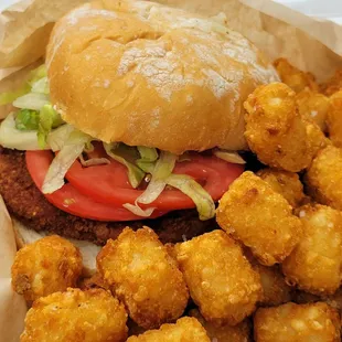 Chik&apos;n sandwich and tots