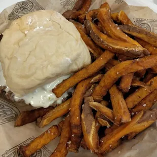 Spinach artichoke cheeseburger with side of sweet potato fries