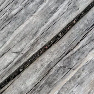 a close up of a wooden surface