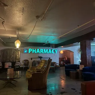 a neon sign in the lobby