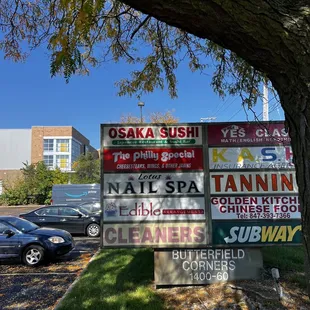 a lot of signs in a parking lot