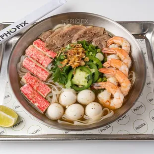 Build your own bowl with crab sticks, brisket, shrimp, quail egg