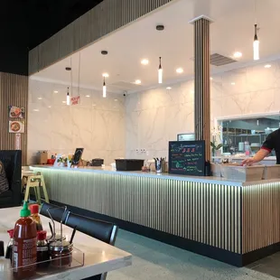 a man standing at a counter