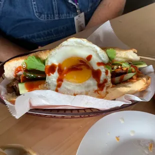 Banh Mi with fried egg and sriracha