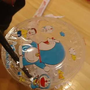 a plastic cup with a cartoon character on it