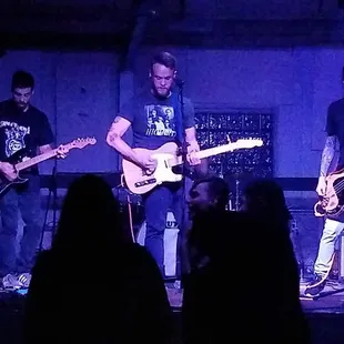 a band playing on stage