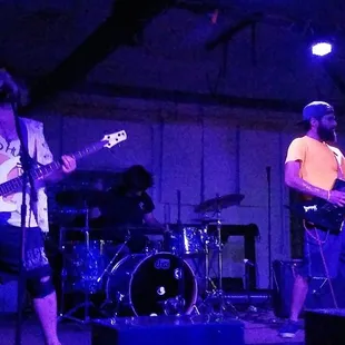 a band performing on stage