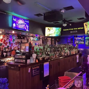 The right side of the bar from where I am sitting great views including the handsome bar tender!