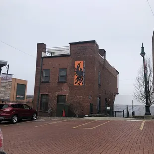 a brick building with a clock on it