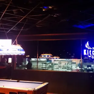 a pool table in the foreground