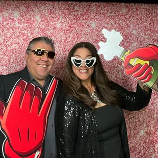 Birthday Party with Big Hand Props and pink sparkle backdrop!