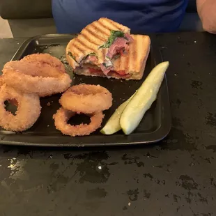 Italiano Pannini with onion rings.