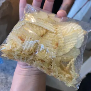 Chip crumbs that we got instead of fries.